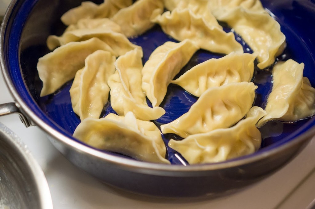 Pan-frying the parboiled dumplings