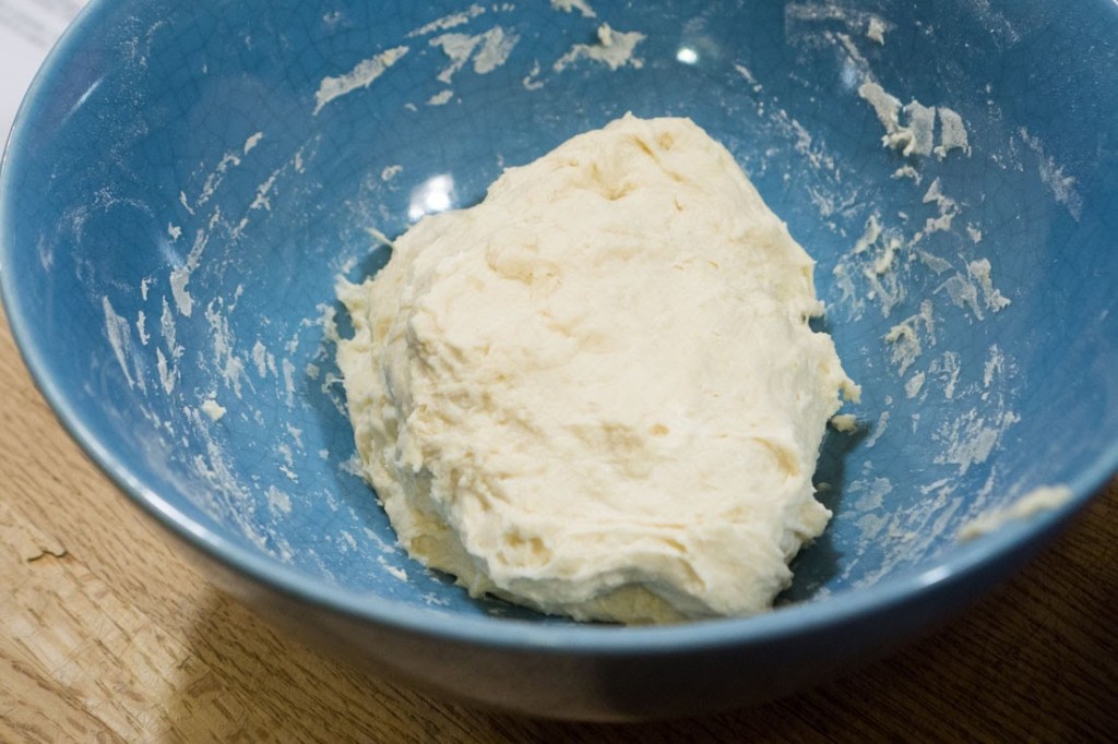 Cold-water dough: sticky and stretchy with gluten. This dough needs a bit more flour to make it workable for dumpling wrappers.