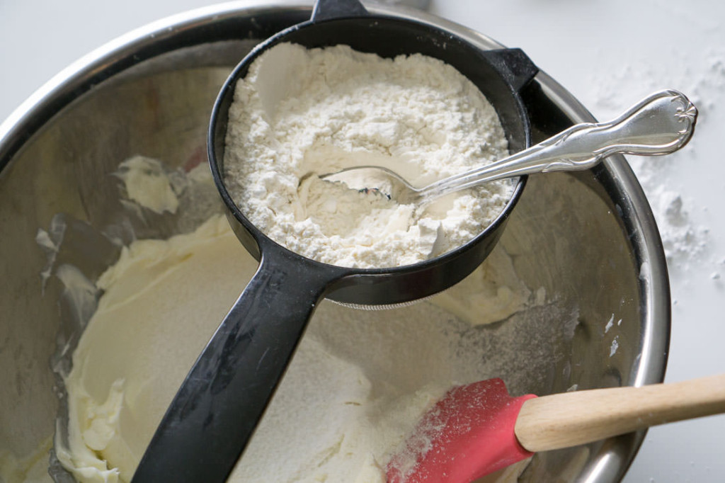 Sifting in the flour and powdered sugar