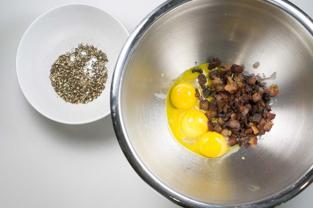 Pepper, yolks, bacon -- a delicious trifecta.