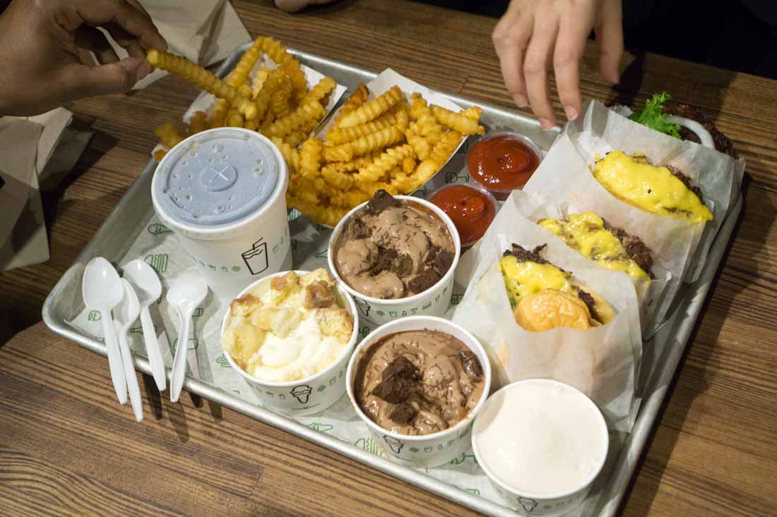 Our post-Alinea snack of Shake Shack burgers, fries, and frozen custard.